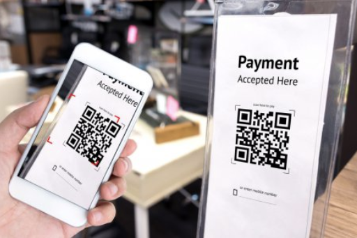 Customers scan a QR code with their smartphones from businesses and make digital payments instantly.